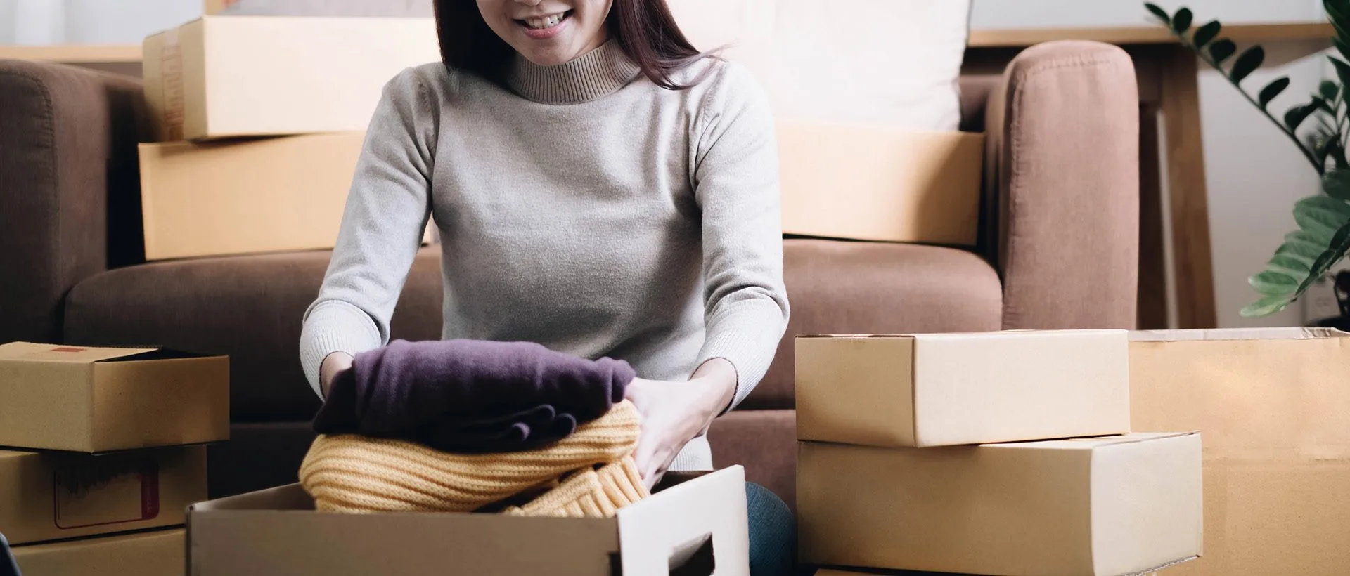 Woman packing her clothes