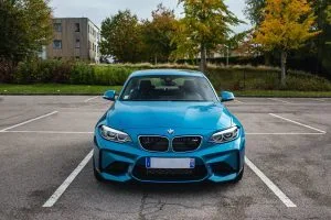 Blue BMW parked outside